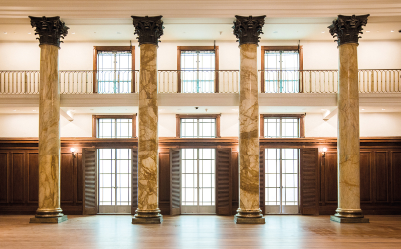 The brass and marble columns and the original lighting fixtures at the City Hall Chamber have been restored.