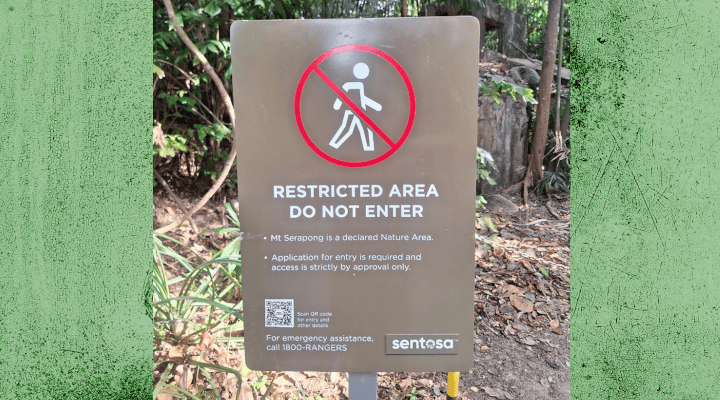 A sign outside Mount Serapong, a protected natural area in Sentosa. Visitors can scan the QR code on the sign and learn about the do’s and don’ts of visiting such areas.