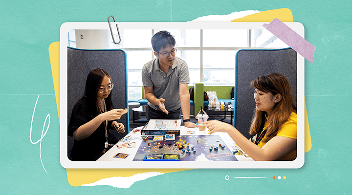 Lim Tze Min (centre) teaches the gameplay of &lt;em&gt;Pandemic&lt;/em&gt;, a board game where a team works together to stop the spread of diseases across borders.