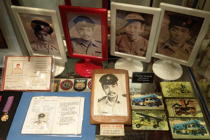 WO(V) Yunnos helps to maintain the displays, including old photographs and firefighting paraphernalia, at the Civil Defence Heritage Gallery.