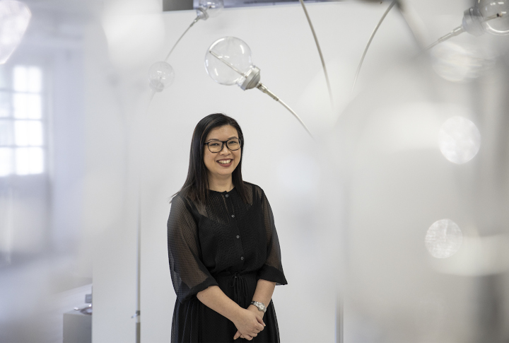 Stephanie Foo poses with the light props that were used during the launch of the Singapore Bicentennial.